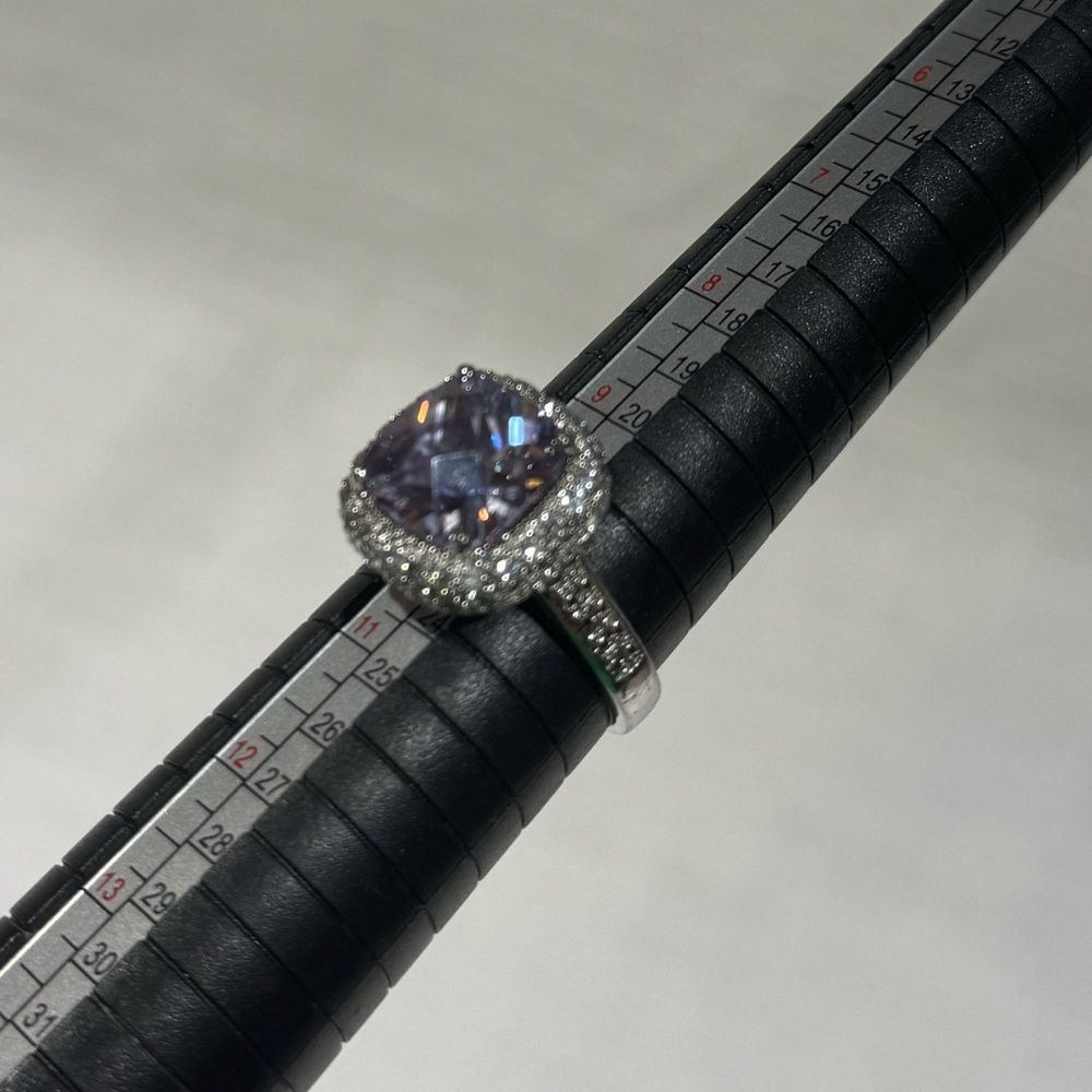 Elegant Silver and Purple Gemstone Ring